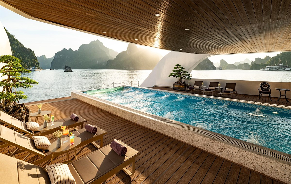 Ha Long Bay luxury cruise infinity pool on deck facing the limestone islands